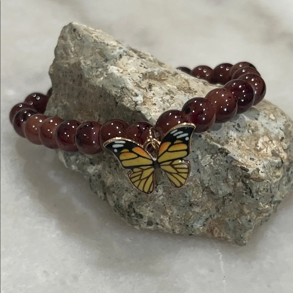 Elegant Brown Beaded Bracelet with Butterfly Charm